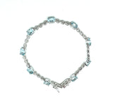 Blue Topaz And Diamond Accent Bracelet in sterling silver